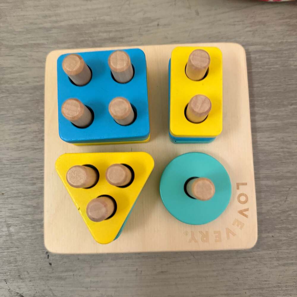 Lovevery Sort & Stack Peg Puzzle from The Enthusiast Play Kit